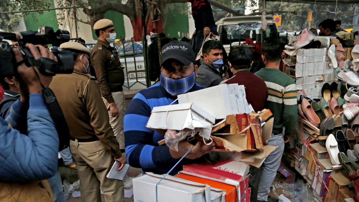 Representational file photo. | Street vending often face eviction and enforcement action. This photo shows officials evicting street vendors from Delhi's Sarojini Nagar Market. | ANI