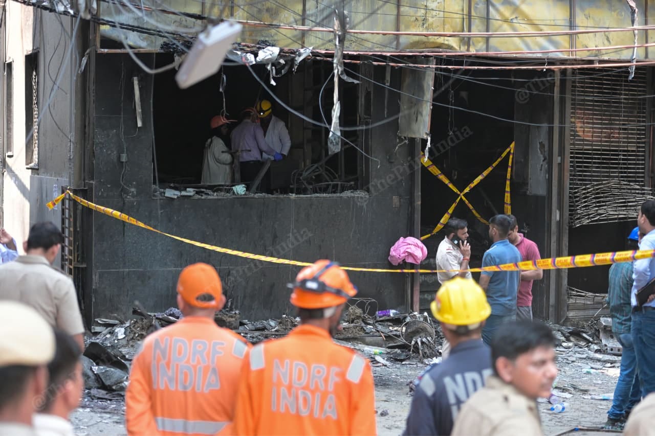 NDRF and forensics teams at the site of the fire | Suraj Singh Bisht | ThePrint