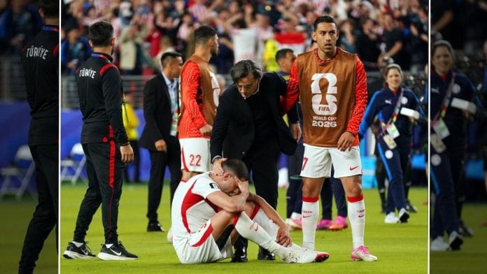 Turkey coach Vincenzo Montella with a dejected Merih Demiral after they crashed out of the 2026 FIFA World Cup | David Gonzales | Reuters