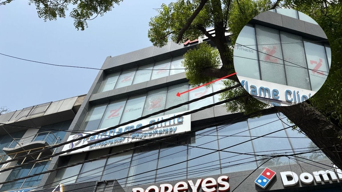 Two glass panes that are cracked after the firing incident in Guru Randhawa's Delhi gym | By special arrangement