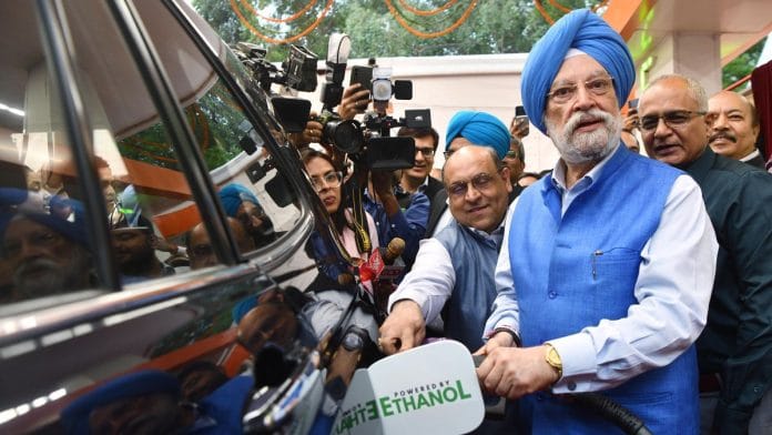 Union Minister for Petroleum and Natural Gas Hardeep Singh Puri fills E85 fuel in a car during the during the launch on 5 June, World Environment Day at an Indian Oil fuel station on Pusa Road in New Delhi | ANI