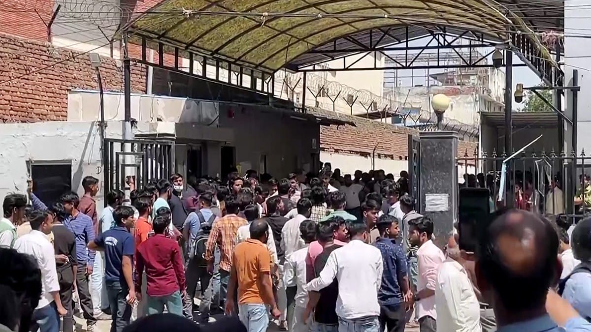 Factory workers protest at MCM company gate in Sector 63, B Block , in Noida on 13 April 2026 | Sumit/ANI