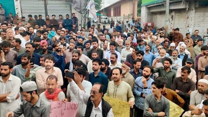 Protestors raise slogans anti Pakistan slogans, in Rawalkot of Pakistan occupied Kashmir on Tuesday. | ANI Photo/ANI Pics Service