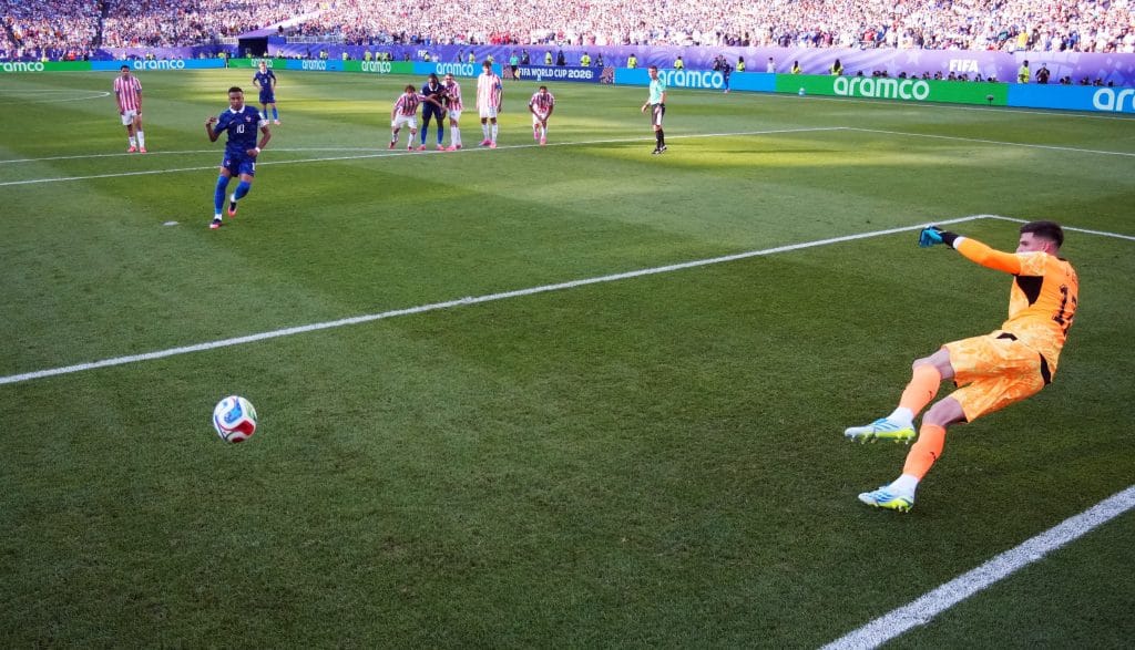France's Kylian Mbappe scores their first goal from the penalty spot against Paraguay in the 2026 FIFA World Cup | Omar Aziz | Reuters