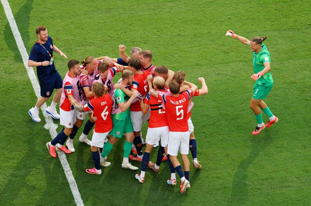 Norway players celebrate after Erling Haaland opens its scoresheet in the 80th minute | Carlos Barria | Reuters 