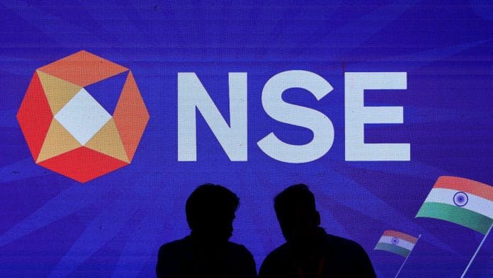 FILE PHOTO: People talk inside the National Stock Exchange (NSE) in Mumbai, India, August 14, 2025. REUTERS/Francis Mascarenhas/File Photo | Reuters