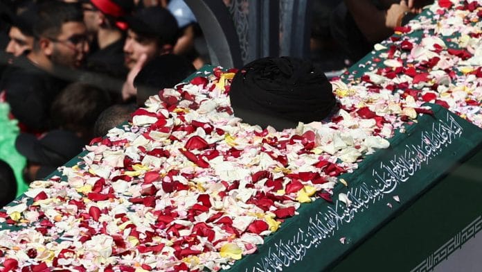 A vehicle carrying coffins of Iran's late Supreme Leader Ayatollah Ali Khamenei and his family members, makes its way as people attend a funeral procession for Khamenei, who was killed on February 28 in Israeli and U.S. airstrikes, in Tehran, Iran, July 6, 2026. Majid Asgaripour/WANA (West Asia News Agency) via REUTERS