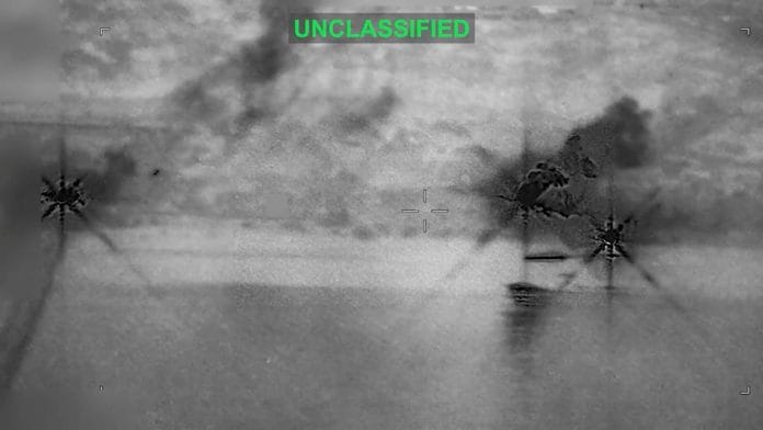Smoke rises at an unknown location following what the U.S. Central Command says is a new wave of strikes against Iran on Tuesday after three tankers were hit by projectiles in the Strait of Hormuz, in this still image taken from video released July 7, 2026. | U.S. Central Command/Handout via REUTERS