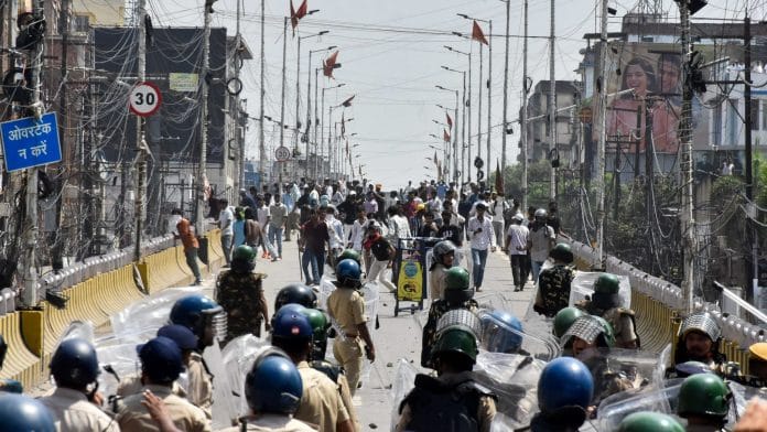 Protesters engage in a clash with policemen during Bihar Bandh call for demanding the resignation of Education Minister Dharmendra Pradhan over National Eligibility cum Entrance Test (NEET) examination paper leaks, in Patna, India, July 25, 2026. | Sonu Kishan / REUTERS