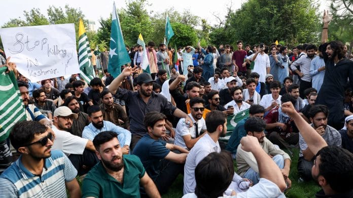 People chant slogans in support of peaceful protesters in Pakistani Kashmir, during a demonstration in Islamabad, Pakistan, July 29, 2026. Salahuddin / REUTERS