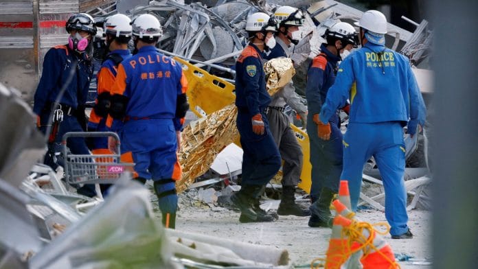 Rescue workers conduct a search operation at the damaged Aeon Mall shopping centre after an earthquake with a magnitude of 7.1 struck Japan's southern Kumamoto Prefecture, in Kashima Town, Kumamoto Prefecture, Japan, July 30, 2026. Kim Kyung-Hoon / REUTERS