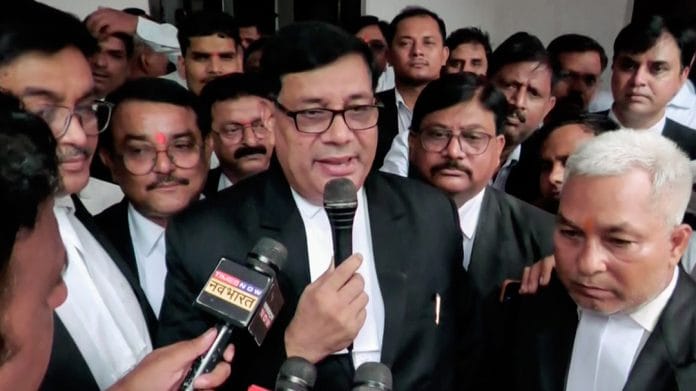 President of Faizabad Bar Association Kalika Prasad Mishra, speaks to the media ahead of marching to Ram Janmabhoomi police station with advocates to lodge an FIR in the alleged theft of donations to the Ayodhya Ram Temple, in Ayodhya on Thursday | ANI