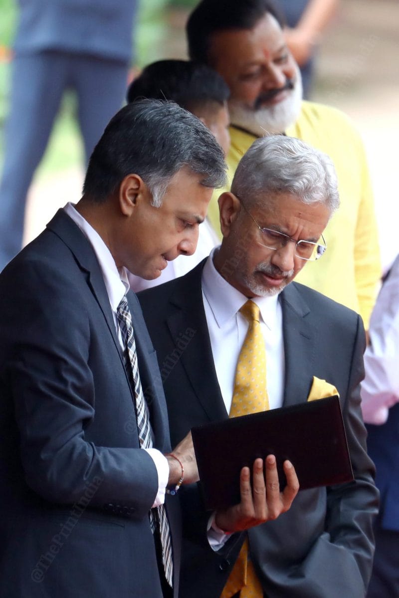 Jaishankar along with Indian Foreign Services officer Manharsinh Yadav at Rashtrapati Bhavan | Praveen Jain | ThePrint
