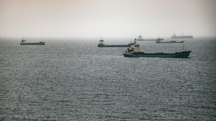 Crude oil tankers, bulk carriers and vessels sit anchored around Qaboos Port on June 22, 2026 in Muscat, Oman. The Strait of Hormuz, a vital shipping route for the region's oil and gas, was effectively blockaded since the outbreak of war between the United States and Iran in late February. This week's provisional peace deal between the countries was meant to reopen the waterway to shipping traffic, but the pace of that reopening is unclear amid continued fighting in Lebanon and the need to clear the Strait of sea mines. On Sunday, U.S. Vice President JD Vance arrived in Switzerland for high-level talks with the Iranian delegation, as the two sides seek to clarify the terms of ending the war. Photographer: Elke Scholiers/Getty Images