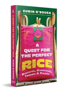 Cover of 'A Quest for the Perfect Rice' by Zubin D'souza, featuring bold typography over a pink gurney bag.