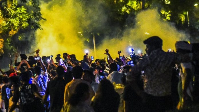 Smoke rises as security personnel fire teargas shells to disperse protesters part of Cockroach Janata Party’s (CJP) march near Jantar Mantar in New Delhi Wednesday | ANI