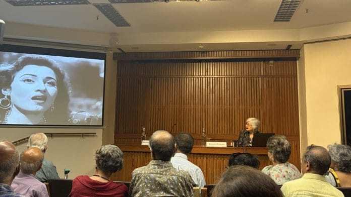 Scholar Shikha Jhingan played clips from various songs during the talk at India International Centre, New Delhi | Tarini Unnikrishnan | ThePrint