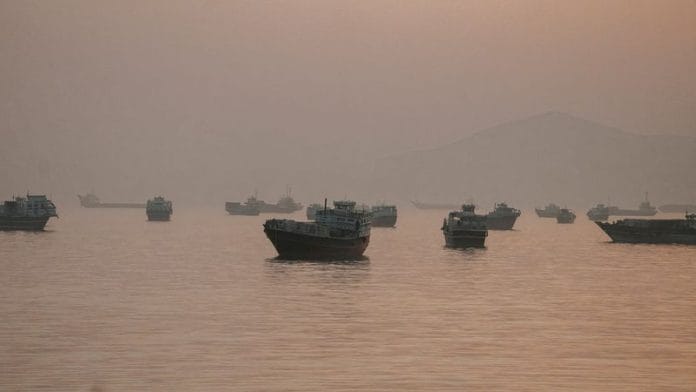Vessels are anchored in the Strait of Hormuz as seen from Musandam, Oman, June 3, 2026. REUTERS/Stringer/File Photo//File Photo