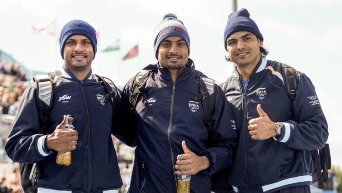From left, India's Yash Vir Singh, Rohit Yadav and Neeraj Chopra pose for photographs at the Commonwealth Games 2026, in Glasgow, Scotland. | Ravi Choudhary/PTI