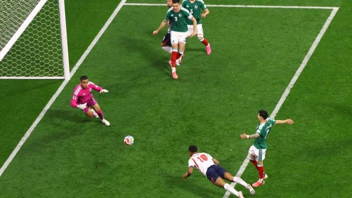 Jude Bellingham scores the first goal for England against Mexico in the FIFA World Cup | Henry Romero | Reuters