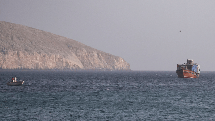 A vessel in the Strait of Hormuz, as seen from Musandam, Oman on 16 July | Reuters