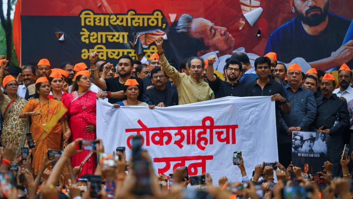 Shiv Sena (UBT) chief Uddhav Thackeray (wearing cream colour kurta), party leader Aditya Thackeray (right to Uddhav) and others during a rally in support of activist Sonam Wangchuk's hunger strike, in Mumbai | PTI File