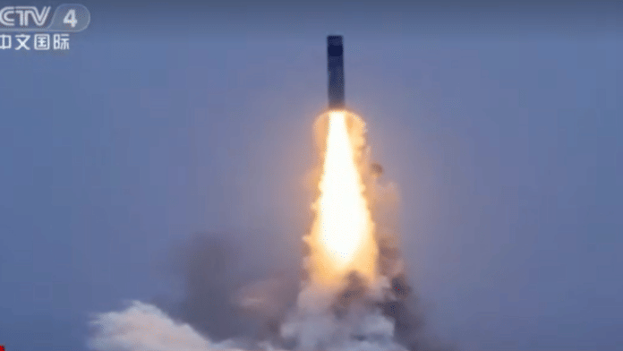 China's military test-fired a missile from a nuclear-powered submarine into the Pacific on Monday, state media reported | Reuters video grab