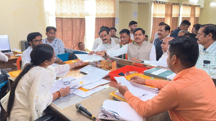Narottam Mishra with Ashutosh Tiwari and CM Mohan Yadav filing nomination paper for Ashutosh Tiwari on Monday. | X/@drnarottammisra