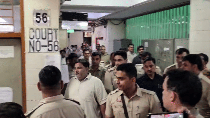 Tahir Hussain (second from left) and other convicts being brought to the Karkardooma Court ahead of the pronouncement of the sentence in the Ankit Sharma murder case, in New Delhi on Friday | ANI