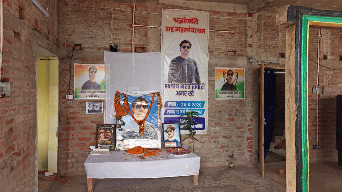 Posters eulogising Bharat Tiwari at his house in Bhojpur's Bilauti village | Mayank Kumar | ThePrint