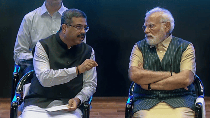 File photo of Dharmendra Pradhan with Prime Minister Narendra Modi | ANI