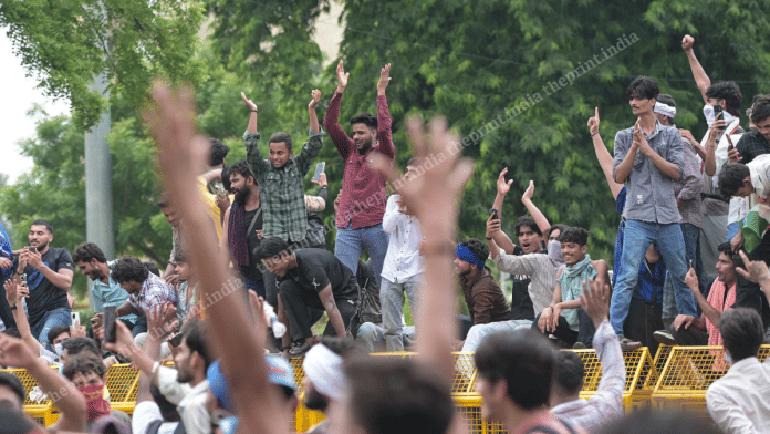 Jantar Mantar protesters celebrate after the resignation of Education Minister Dharmendra Pradhan | Suraj Singh Bisht | ThePrint