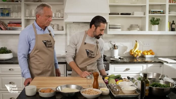 In the first episode, Robert F Kennedy Jr (left) teamed up with chef Andrew Gruel at his Huntington Beach, California, home to make crispy salmon cakes with an apple, white bean and greens salad | Screengrab from YouTube video