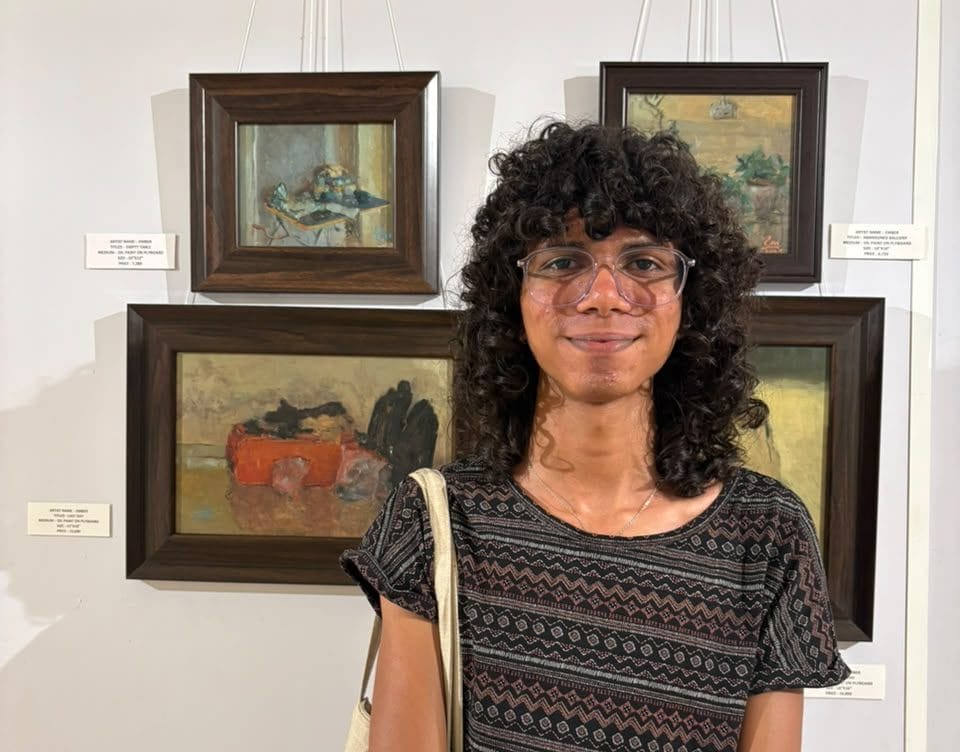 Artist Ember with her artwork | Photo: Sakshi Mehra/ThePrint
