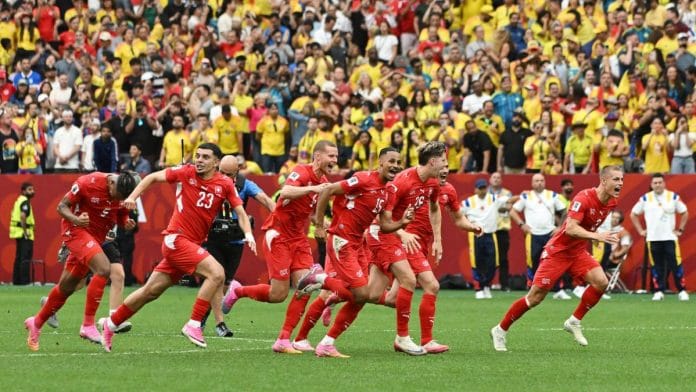Switzerland players celebrate after winning against Colombia 4-3 in the penalties of the 2026 FIFA World Cup Round of 16 clash | Albert Gea | REUTERS