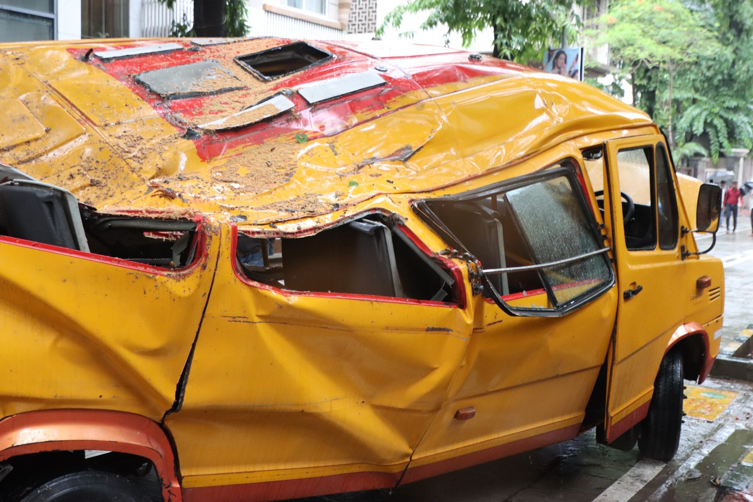 A Universal High School bus in Chembur crushed under a fallen tree on 30 June. The incident left 13 children stranded inside and claimed the life of a 11-year-old boy | Photo by special arrangement