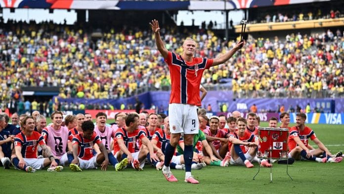 Erling Haaland celebrates with teammates after Norway defeated Brazil 2-0 in the 2026 FIFA World Cup | Dylan Martinez | Reuters