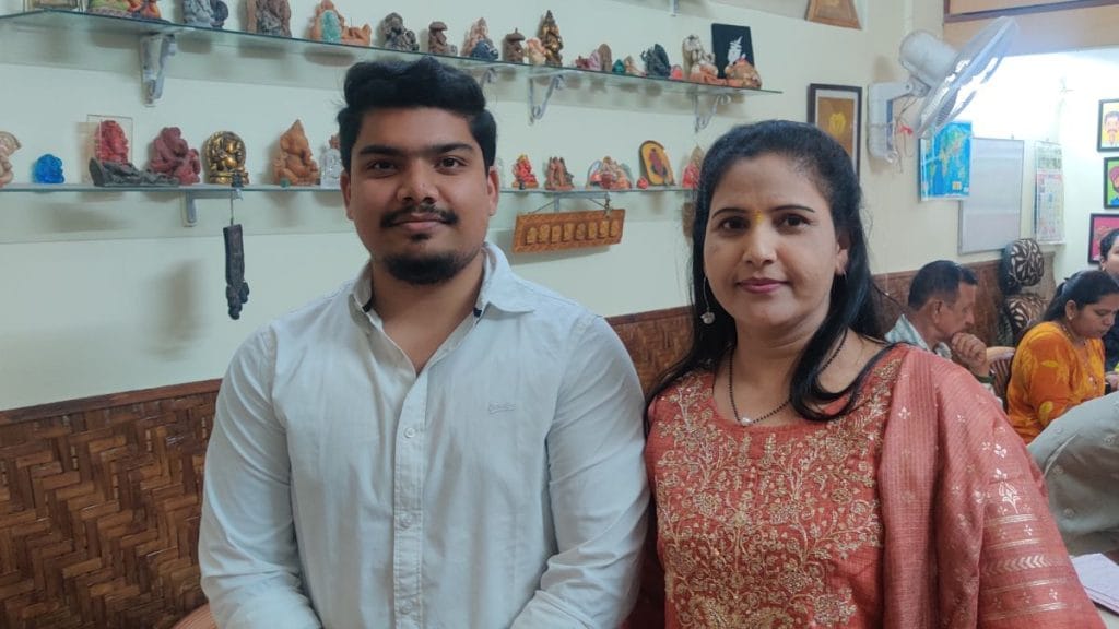 Karan Dhamale with his mother at the Harmony Marriage Bureau in Pune. Stela Dey | ThePrint