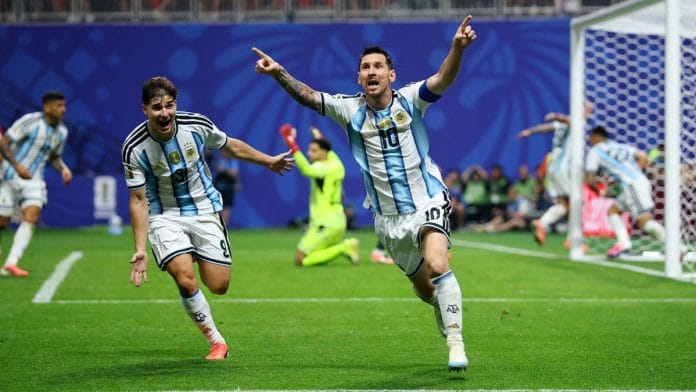 Lionel Messi celebrates after scoring Argentina's second goal against Egypt in the FIFA World Cup Round of 16 | Carlos Barria | Reuters