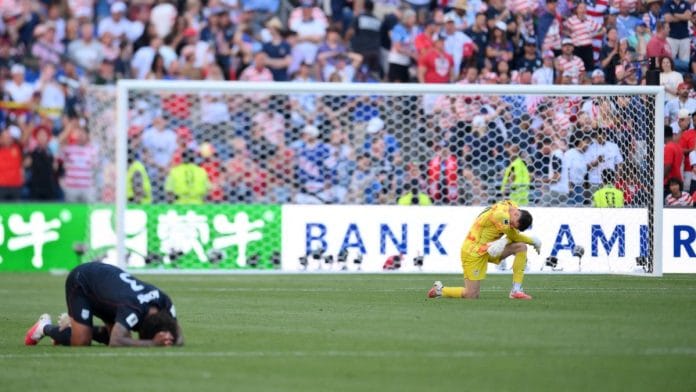 Dejected US players after their defeat against Belgium in the 2026 FIFA World Cup Round of 16 clash | Steven Bisig | Reuters