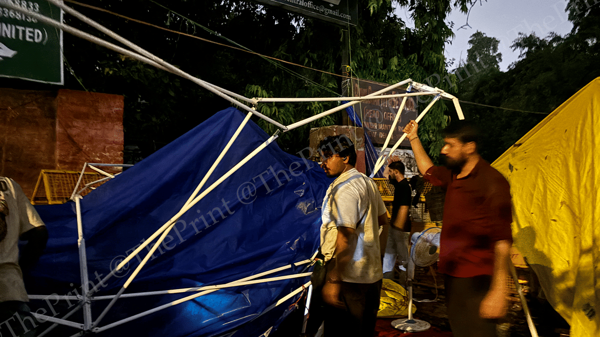 Protesters rebuilding their tents at Jantar Mantar on 20 July 2026 | Samridhi Tewari/ThePrint