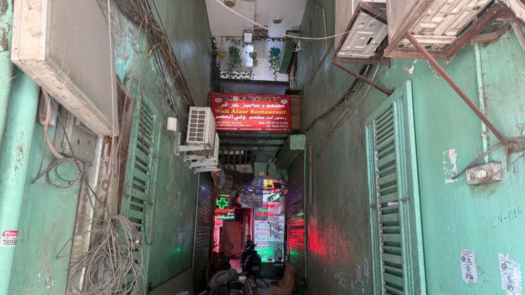 The lane that leads to Wali Alasr. The restaurant is on the first floor, but the lane continues to a currency exchange, and a travel agency ahead. Tarini Unnikrishnan | ThePrint