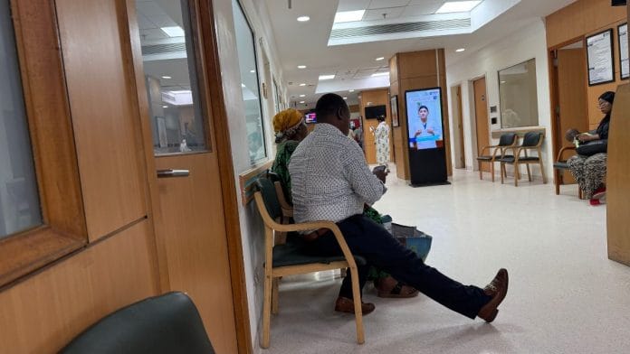 Ben, a refugee from the Democratic Republic of Congo, explains the next step to his patient at Max Hospital, Saket. Tarini Unnikrishnan | ThePrint