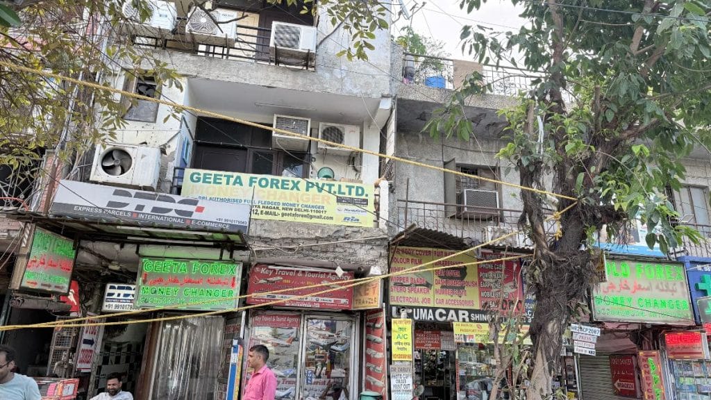 The street opposite Max Hospital is littered with currency exchanges, travel agencies, with rooms above them, and all with signs in multiple foreign languages. Tarini Unnikrishnan | ThePrint