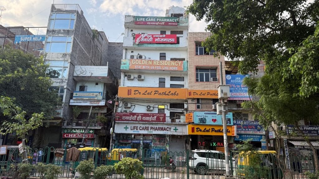 The medical tourism economy has taken over the urban village of Hauz Rani, with chemists, pathology labs, and guest houses filling the narrow lanes. Tarini Unnikrishnan | ThePrint