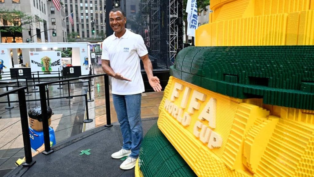 Brazilian legend Cafu with the replica of the World Cup trophy which is made up of more than 1.36 million LEGO bricks, with the weight of the bricks alone being 4.2 tons | Source: LEGO