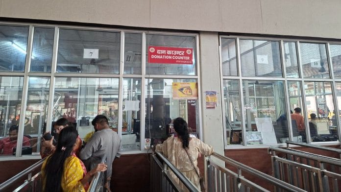 A thin queue at a donation counter outside the Ram Temple gates in Ayodhya | Prashant Srivastava | ThePrint