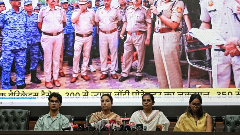 Bloodied uniforms, broken helmets: Kin of cops injured in protest urge Parliament to address police safety