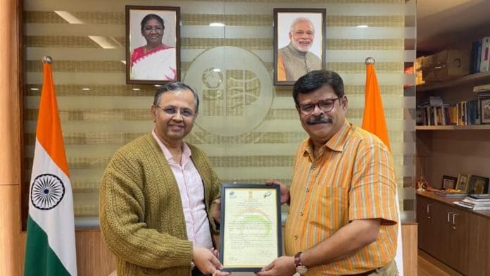 Registrar of Copyrights Unnat Pandit (left) handing over the registration certificate of SRAI to Vinod Ranganath at his office in Mumbai on 30 December 2024 | Photo: Vinod Ranganath