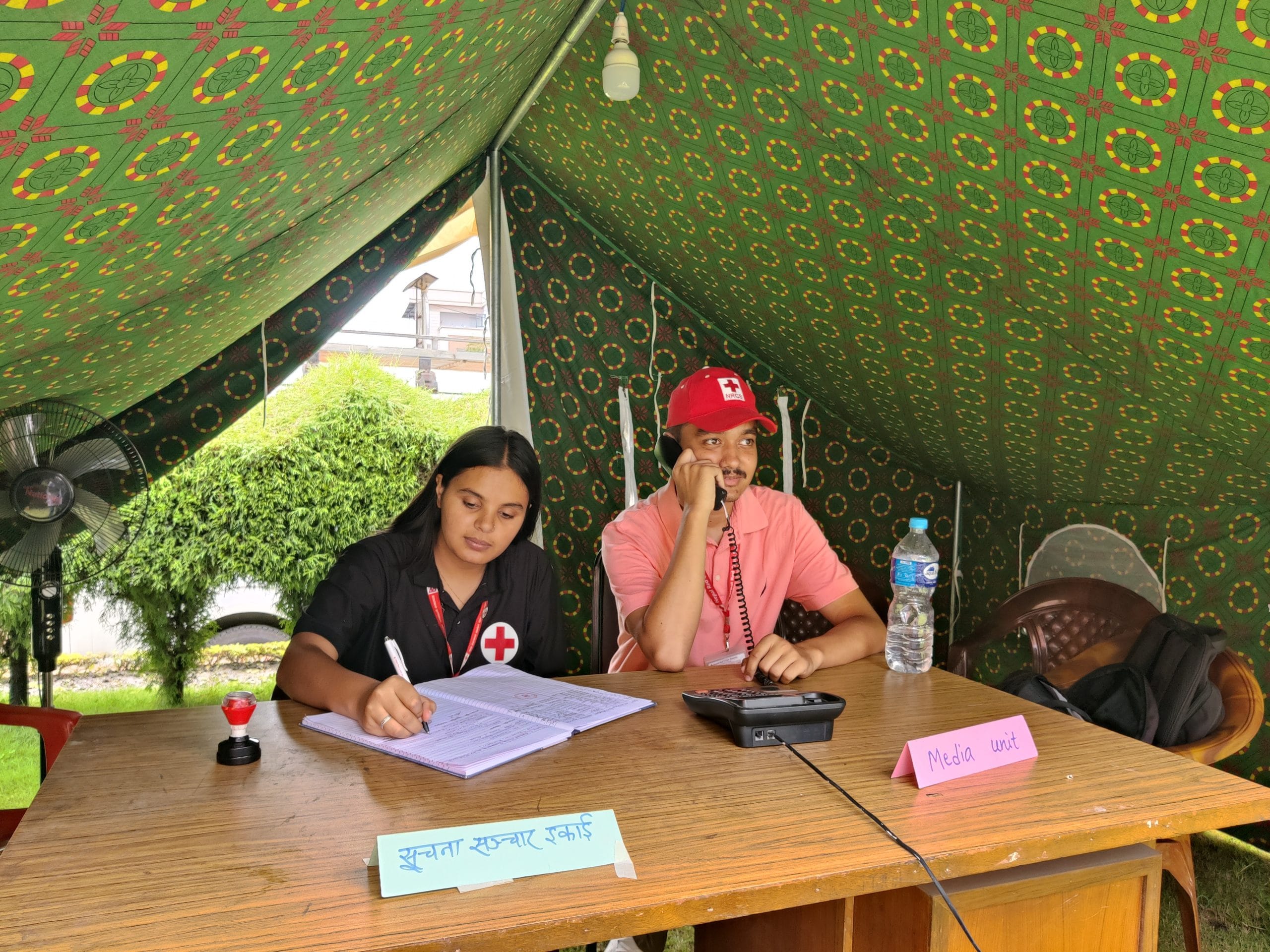 Young college volunteers helping with Red Cross helplines for flood donation and queries | Akanksha Mishra, ThePrint